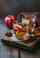 AI generated three glasses of apple cider with apples and spices photo