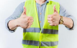 Engineer hands with thumbs up in approval gesture isolated. Engineer thumbs up in approval gesture on isolated background photo