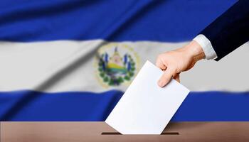 Hand holding ballot in voting ballot box with El Salvador flag in background. El Salvador presidential elections concept photo