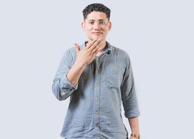 Man making THANK YOU gesture in sign language isolated. People showing THANK YOU gesture in sign language. Non-verbal communication concept photo