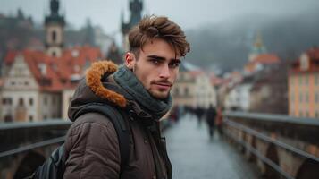 AI generated Young man looking at the camera while standing on a bridge in an old European town photo