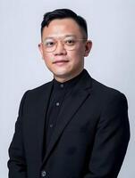 AI generated Corporate image photo of Asian man in black suit isolated. High quality. AI Generative