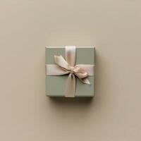 AI generated Flat lay top-down shot sage green ring box with cute tape bow. Present box on the light olive background. High quality. AI Generative photo