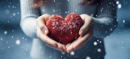 AI generated women's hands holding a heart of snow to create a beautiful mood in winter, photo