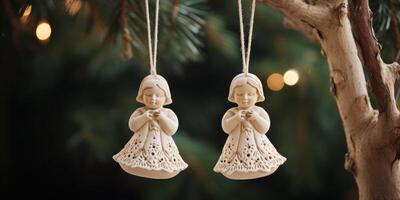 AI generated two christmas angels hanging from a christmas tree photo