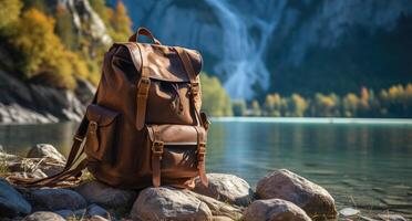 AI generated a brown backpack sits on a rock beside water in the mountains photo