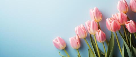 ai generado un imagen de rosado tulipanes en un pastel marco foto