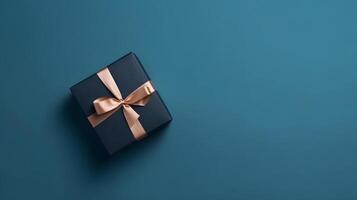 AI generated One dark blue gift box in craft wrapping paper and peachy satin ribbon with bow on light blue clean flat surface background, neural network generated image photo