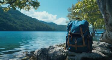 AI generated a large blue backpack sits near the water photo