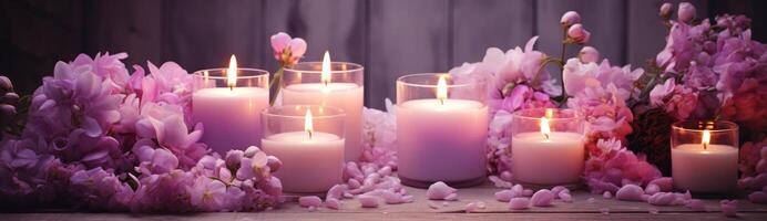 ai generado un imagen de velas y flores con púrpura flores foto