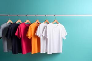 AI generated Hangers with blank monocolor t-shirts on turquoise background, neural network generated image photo