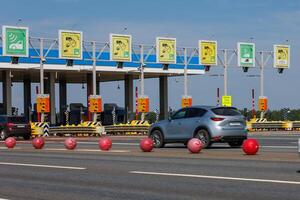 toll road checkpoint at sunny day photo