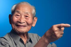 AI generated Asian grandfather looking and smiling with rised index finger on blue background, neural network generated art photo