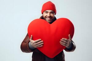 AI generated Caucasian man in red hat holding big red heart on white background, neural network generated photorealistic image photo