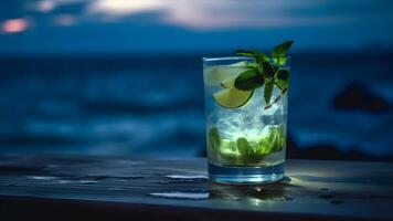 AI generated a glass of refreshing mint mojito summer drink on sea background at summer evening, closeup with selective focus and copy space, neural network generated image photo