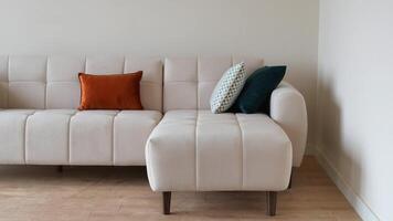 modern sofa with pillows in living room at home video