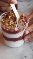 top view of women eating granola Musli in a bowl outdoor video