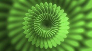 Green bright abstraction. Motion. A flower-like spiral that spins and changes scale photo