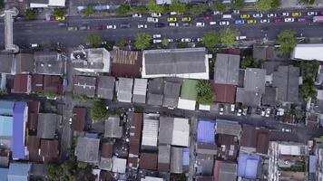 Nice view from the top of houses with tiled roofs. Top view of modern and old houses of the city. Cityscape of town and city from top view. Old and modern architecture of different styles. Authentic photo