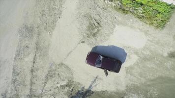 Aerial view on abandoned car with broken windshield. Footage. Abandoned car on the street photo