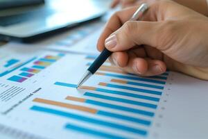 AI generated close up hand Businessman review report. Graphs and charts. Business reports concept Ai generated photo