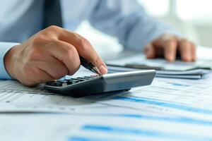 AI generated Financial data analyzing counting concept for Businessman's hands with calculator and laptop on desk in modern office. Generative AI photo