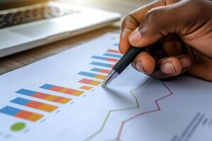 AI generated close up hand Businessman review report. Graphs and charts. Business reports concept Ai generated photo