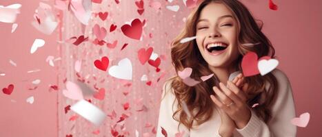 AI generated Excited positive girl smiling and looking at falling heart paper in Valentine day on pink background photo