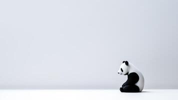 ai generado linda panda oso sentado en blanco antecedentes con Copiar espacio. foto