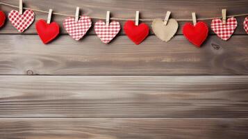 AI generated Valentine Gingham hearts with rope and clip hanging on rustic wood copy space background photo