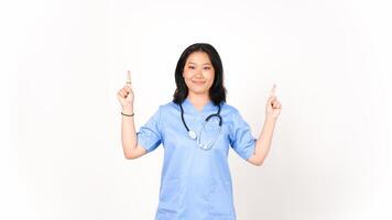 Young Asian female doctor pointing upside copy space isolated on white background photo