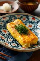 AI generated Folk Flair Tamagoyaki Japanese Omelette on Patterned Plate photo