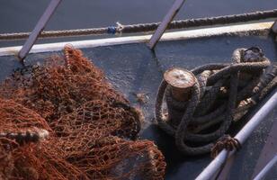 a boat with a rope and a net photo