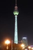 Berlin, Germany, 2021 - Berlin Television tower during the Festival of Lights, Berlin Mitte district, Berlin, Germany photo