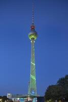 Berlin, Germany, 2021 - Berlin Television tower during the Festival of Lights, Berlin Mitte district, Berlin, Germany photo