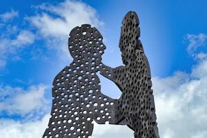 Berlin, Germany, 2021 - Molecule Man, Monumental sculpture by Jonathan Borofsky, Spree river, Berlin, Germany photo