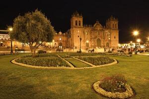 Cathedral of Cusco or Cathedral Basilica of the Virgin of the Assumption at night, Plaza de Armas, Cusco, Peru photo