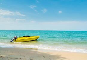 Landscape summer View  area in front of Nara Beach In Chon Buri province with clear skies and clouds, speed boats can be seen. Parked near the coast To serve tourists photo