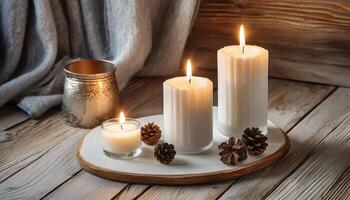 AI generated Lit candles with pine cones on a wooden tray, creating a warm, cozy atmosphere photo
