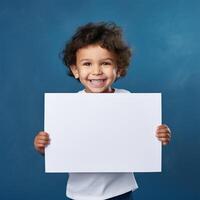 AI generated smiling little girl holding blank white sheet of paper on blue background photo