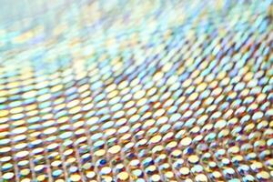 Abstract background made of rhinestones shimmering in the light. photo