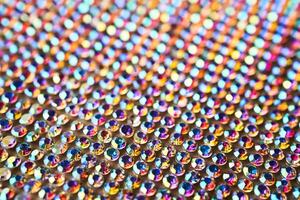 Abstract background made of rhinestones shimmering in the light. photo