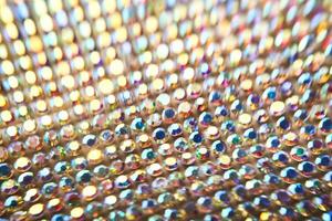 Abstract background made of rhinestones shimmering in the light. photo