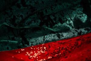 Abstract Christmas background. Red and green velvet fabric with red sparkles. photo