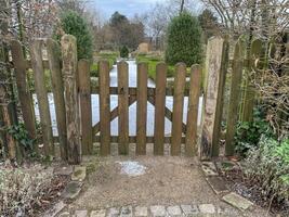 wooden gate to the farm garden photo
