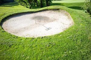part of a golf course, bunker photo
