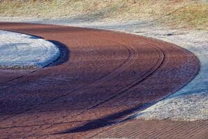 ash running track in the winter of an athletics stadium photo