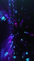 Vertical video - spinning glowing colorful particles with flowing rippled glass effect - looping, full hd motion background animation.