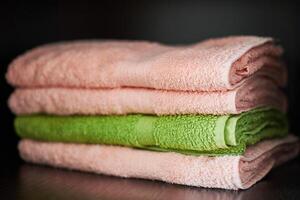 Towels stack on shelf photo