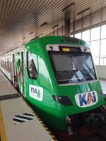 Front view of a train stopped waiting for passengers photo